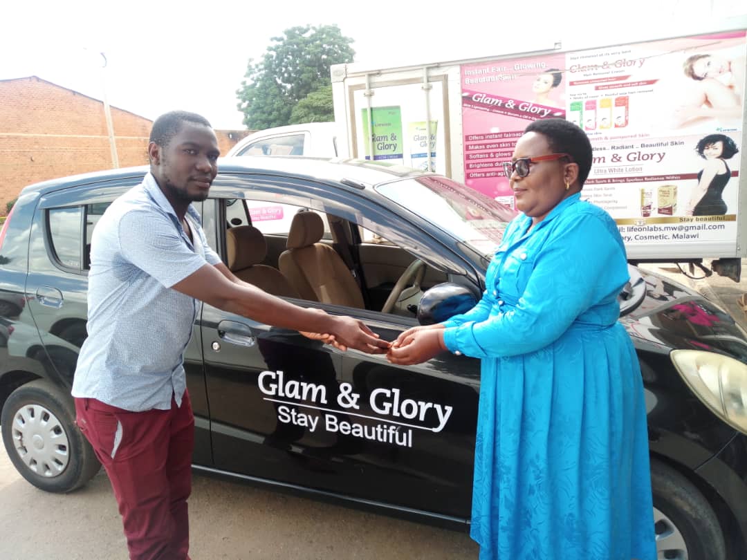 Sales lady Azizi wins car in Glam and Glory stay beautiful promo ...