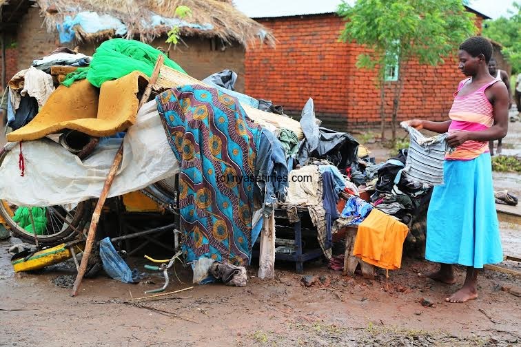 Malawi woman give birth in floods, Bishop appeals for support: Photos ...